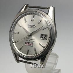 Vintage 1965 SEIKO Seikomatic Weekdater 6218-8971 Automatique 35Jewels Japon #1356	<br/> <br/> (Note: The title is already in English, so the translation would be the same in French.)